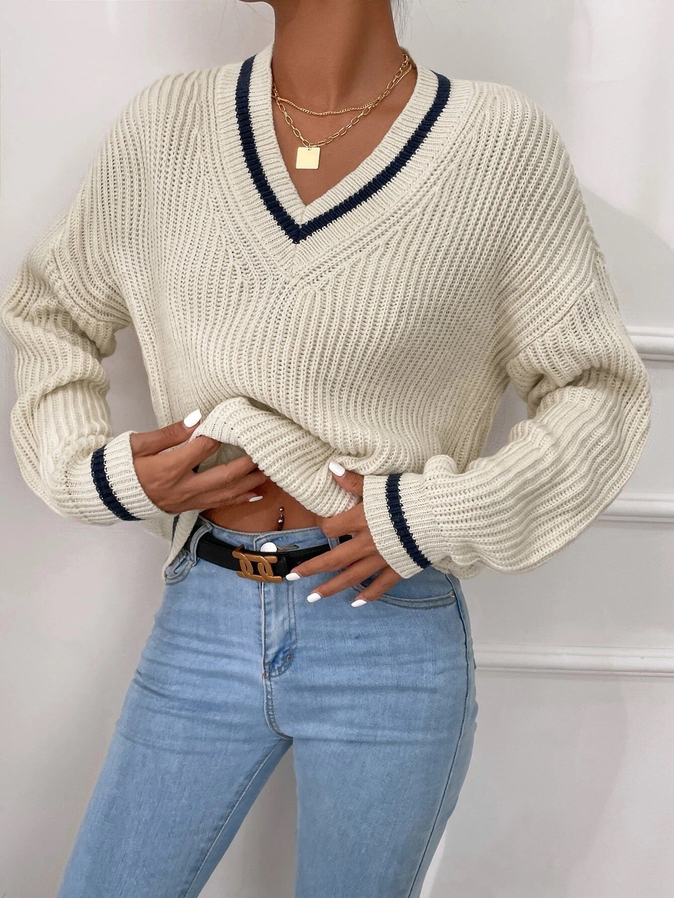 Sweater with patchwork V-neck